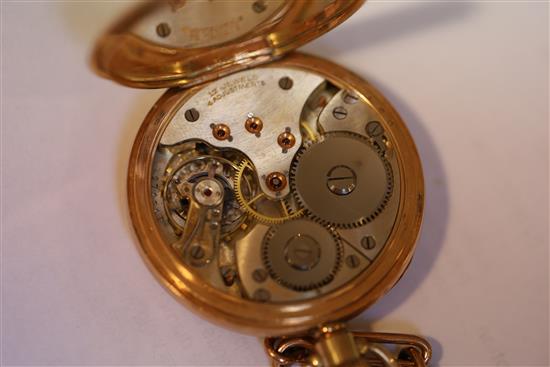 A George V 9ct gold open face keyless lever pocket watch, with Roman dial and subsidiary seconds, together with a 9ct gold albert.